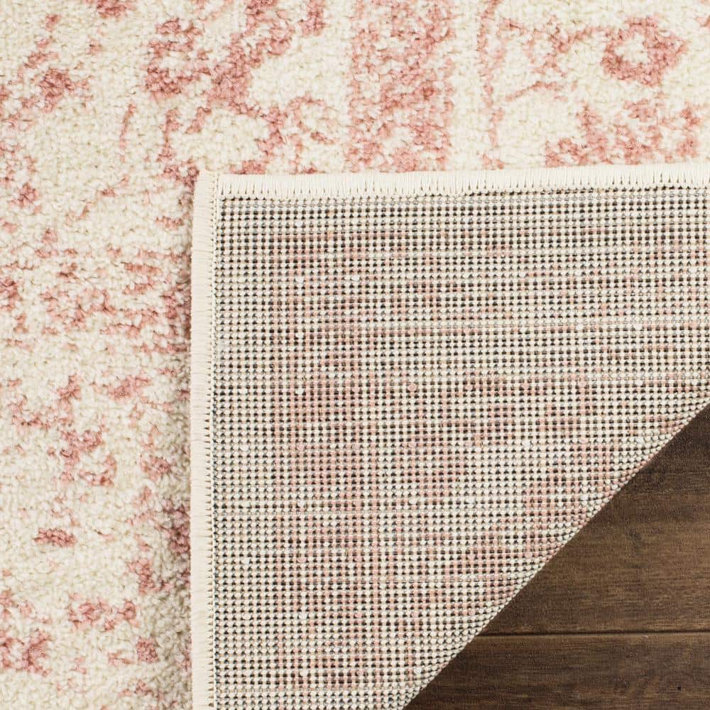 Oversized Ivory and Rose Synthetic Area Rug, 11' x 15'