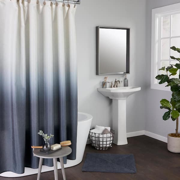 https://images.thdstatic.com/productImages/6d33d6b5-faec-405c-bf84-a2c562f71c08/svn/charcoal-bathroom-rugs-bath-mats-v1229300850007-31_600.jpg