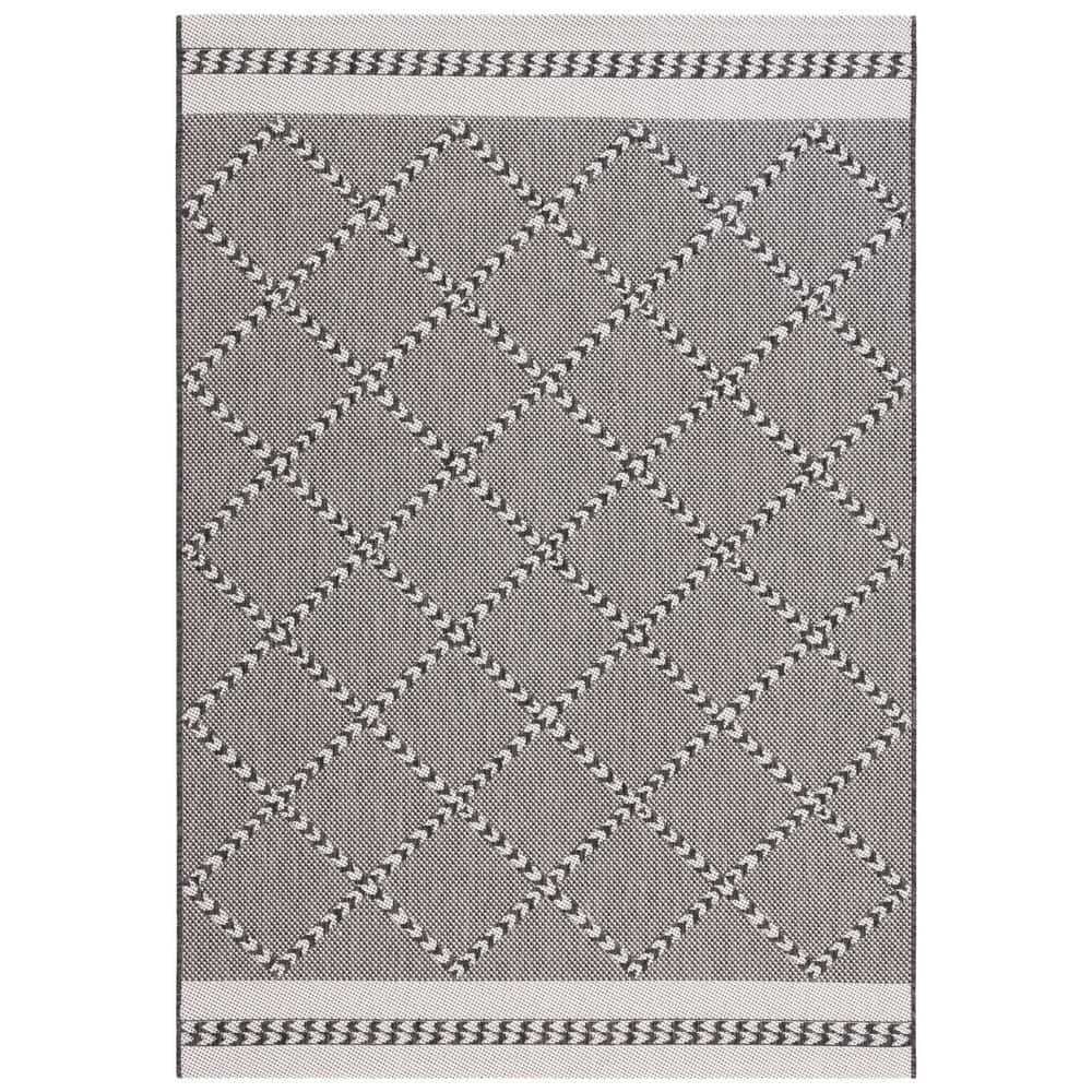 Percival Black and Ivory Geometric 8' x 10' Synthetic Area Rug