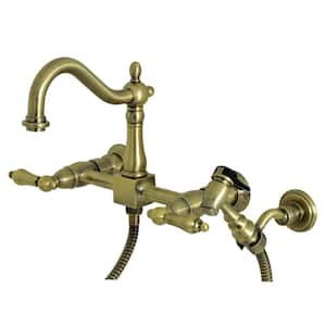 Heritage 2-Handle Wall Mount Kitchen Faucets with Brass Sprayer in Antique Brass
