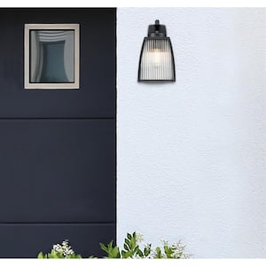 Niko 1-Light Textured Black Outdoor Wall Mount Lantern with Clear Ribbed Glass