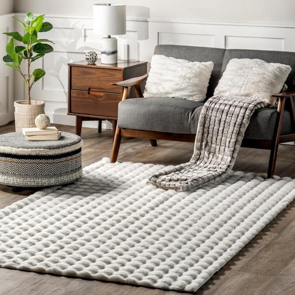 Jeni Solid Faux Rabbit Machine Washable White 5 ft. x 8 ft. Area Rug