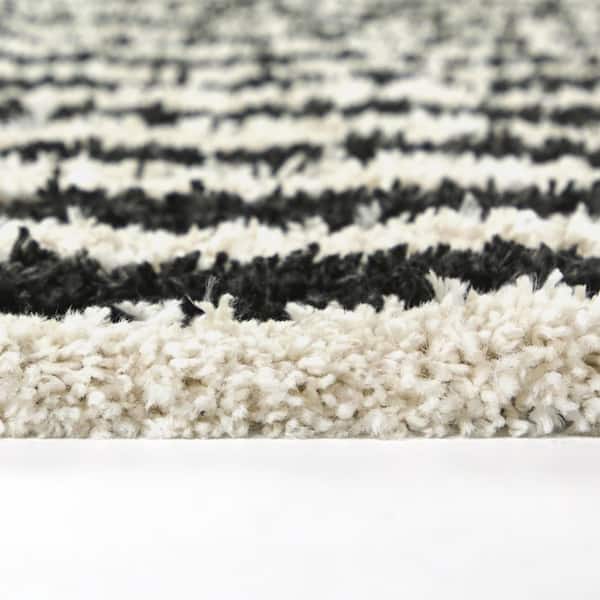 Philbin Cream 5 ft. 3 in. x 7 ft. Striped Area Rug