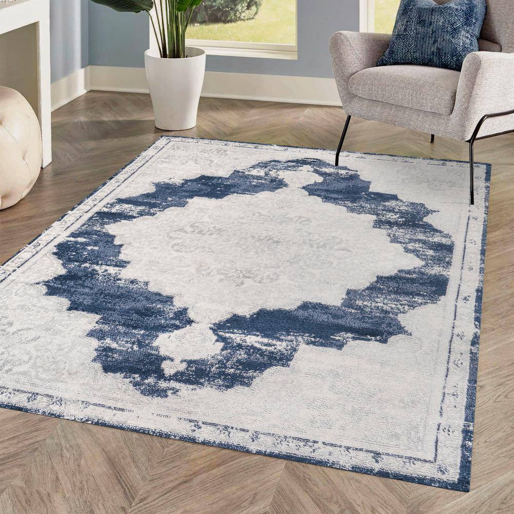Ivory and Navy Synthetic Reversible Medallion Area Rug