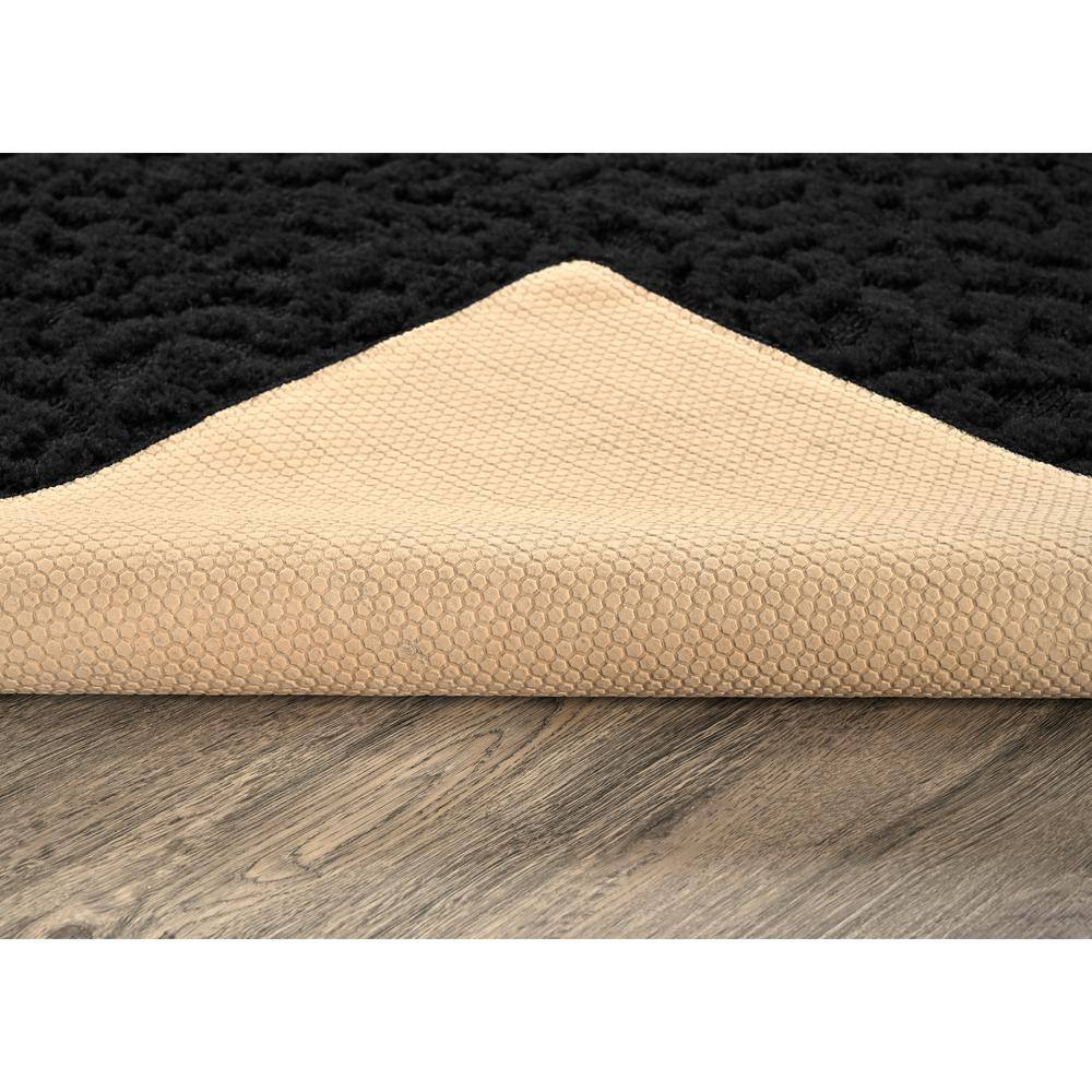 Ivy Collection 6' x 9' Tufted Black Synthetic Area Rug