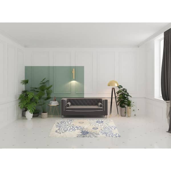 5' X 7' Cream Floral Power Loom Distressed Area Rug