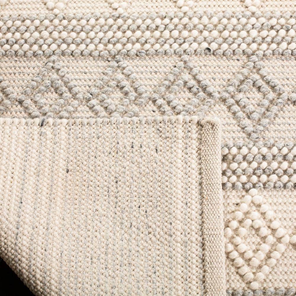 Ivory Coast Elegance Hand-Tufted Wool 24" Tufted Pouf