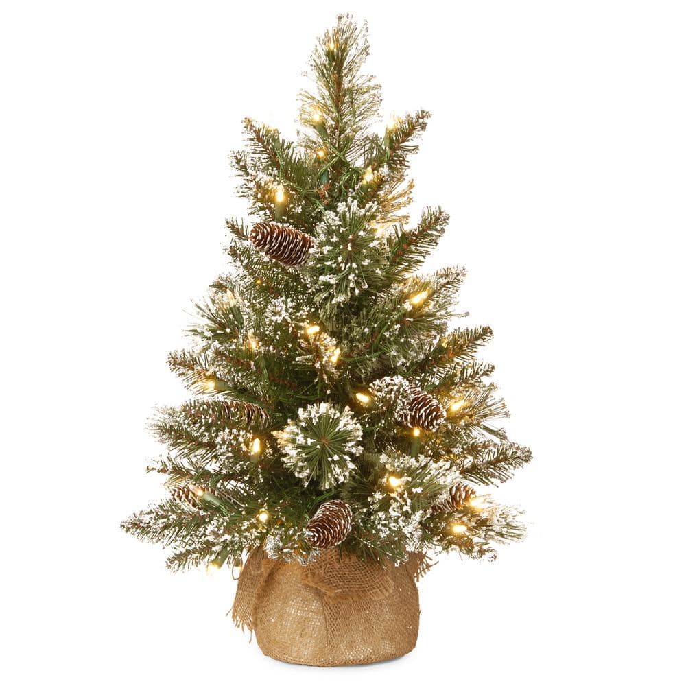 https://images.thdstatic.com/productImages/6dad8a03-2fd4-40f1-9101-60802d3d635c/svn/national-tree-company-christmas-tabletop-trees-gb3-392-20-b1-64_1000.jpg