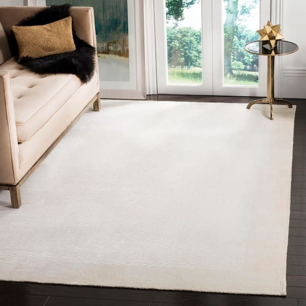 Mirage 8 ft. x 10 ft. Pearl Solid Color Border Geometric Area Rug