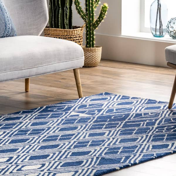 https://images.thdstatic.com/productImages/6df68f96-5c35-47f6-af8b-e517a28bdae4/svn/blue-nuloom-area-rugs-mtjd03a-508-76_600.jpg