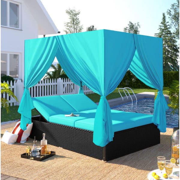 Black Wicker Outdoor Adjustable Seats Day Bed with Blue Cushions and Blue Canopy