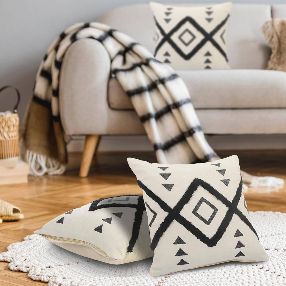 20" Black and Off-White Cotton Geometric Tufted Throw Pillow
