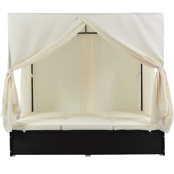 Black Wicker Outdoor Day Bed with Beige Cushions