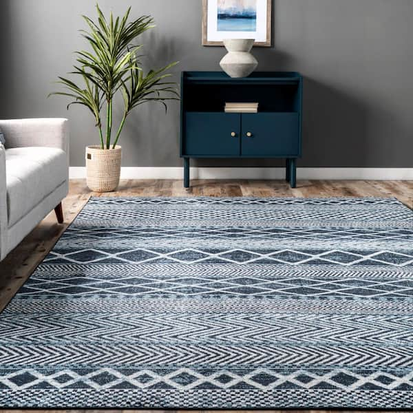 https://images.thdstatic.com/productImages/6e439b6b-ab07-5e1e-9f00-0f30f4939963/svn/blue-nuloom-area-rugs-lpkv09a-2608-31_600.jpg