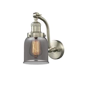 Bell 5 in. 1-Light Brushed Satin Nickel Wall Sconce with Plated Smoke Glass Shade