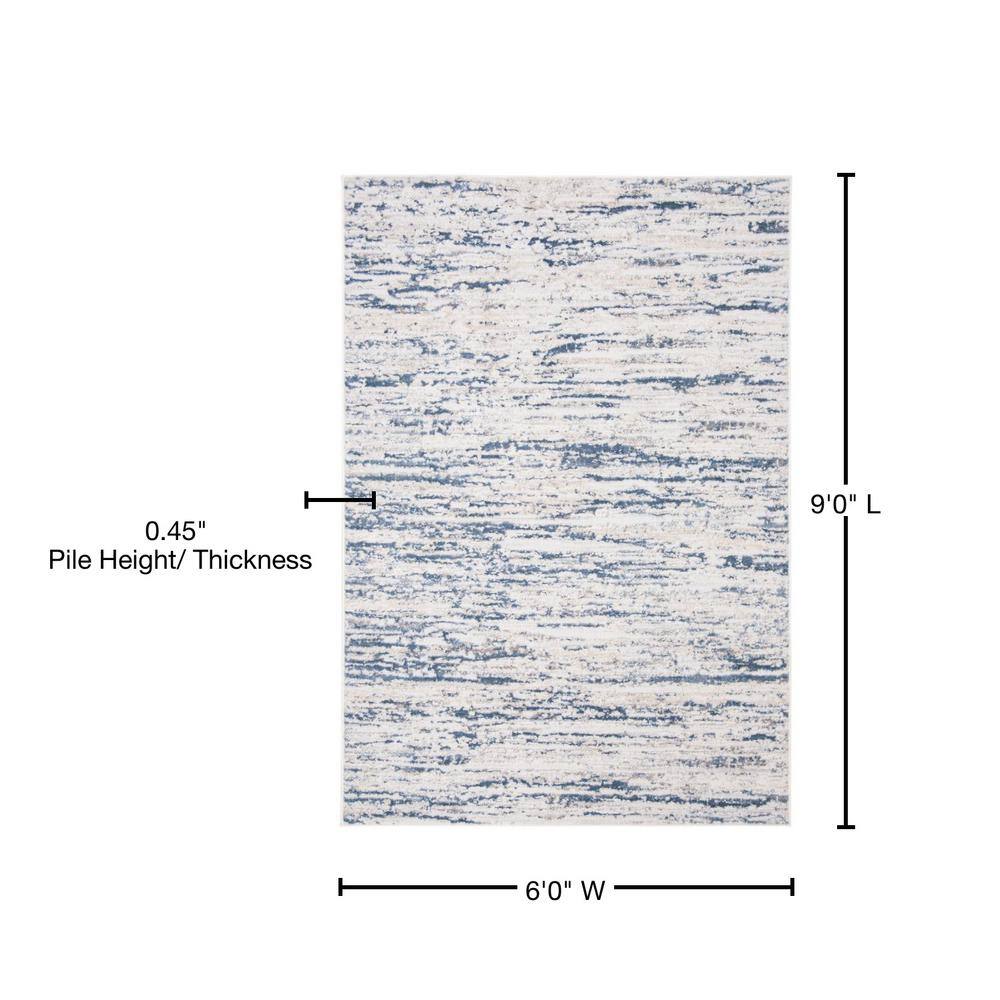 Ivory and Blue Abstract 6' x 9' Stain-Resistant Synthetic Rug