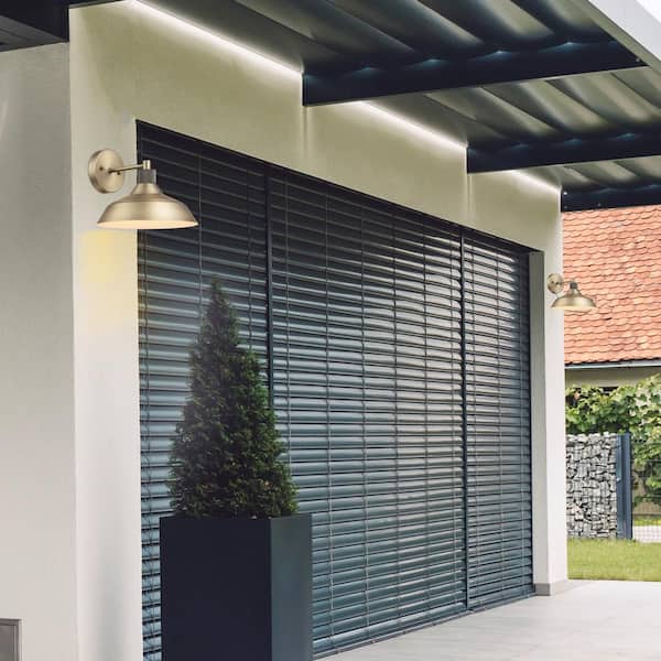 Sutton 1-Light Matte Brass Outdoor Wall Sconce with Textured Socket Detail