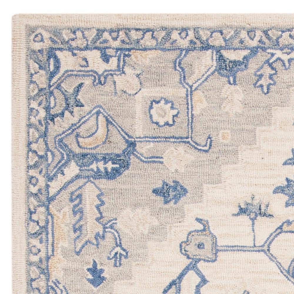 Ivory and Blue Handmade Wool Round Tufted Rug