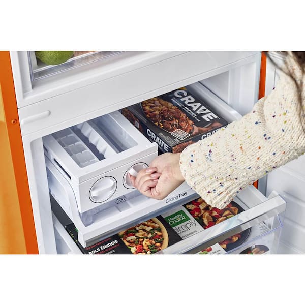 Unique Appliances Classic Retro 23.8 in 11.7 Cu. ft. Frost Free Retro Bottom Freezer Refrigerator Energy Star Orange Creamsicle