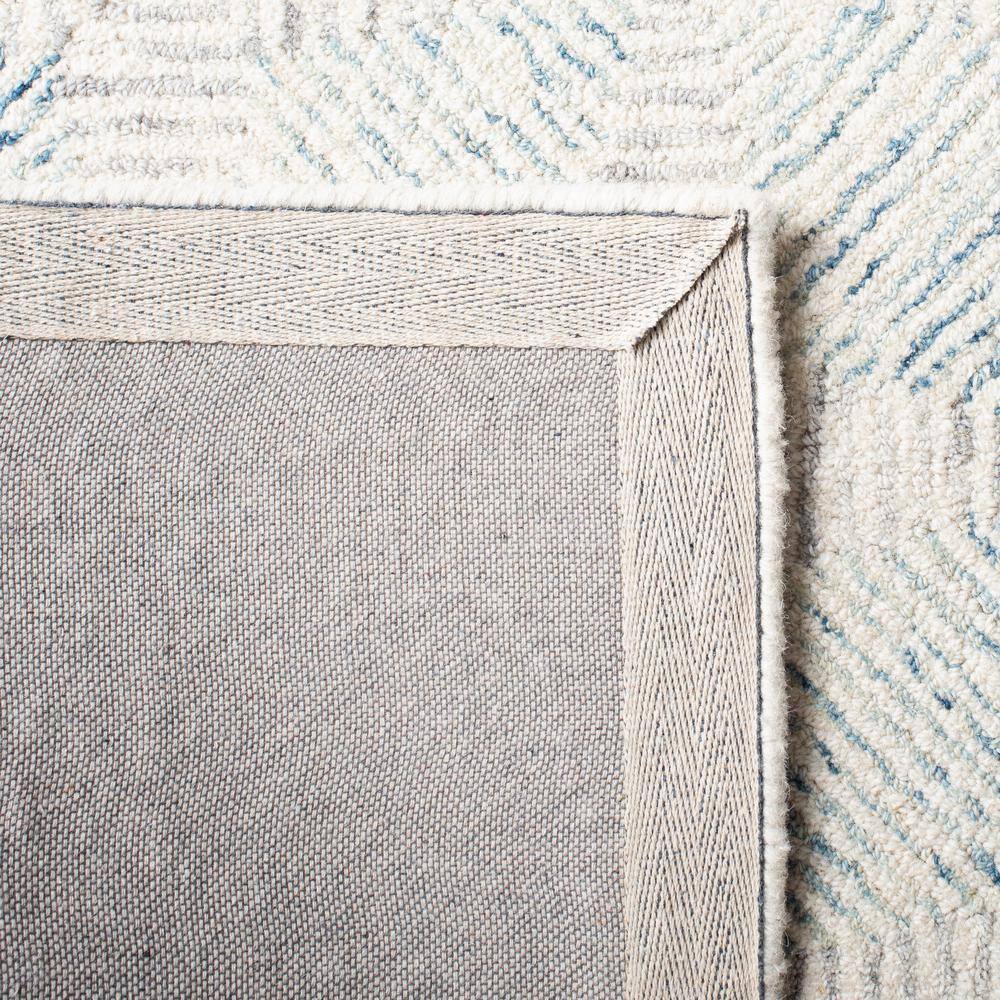 Handmade Light Blue Abstract Wool and Synthetic 4' x 6' Rug