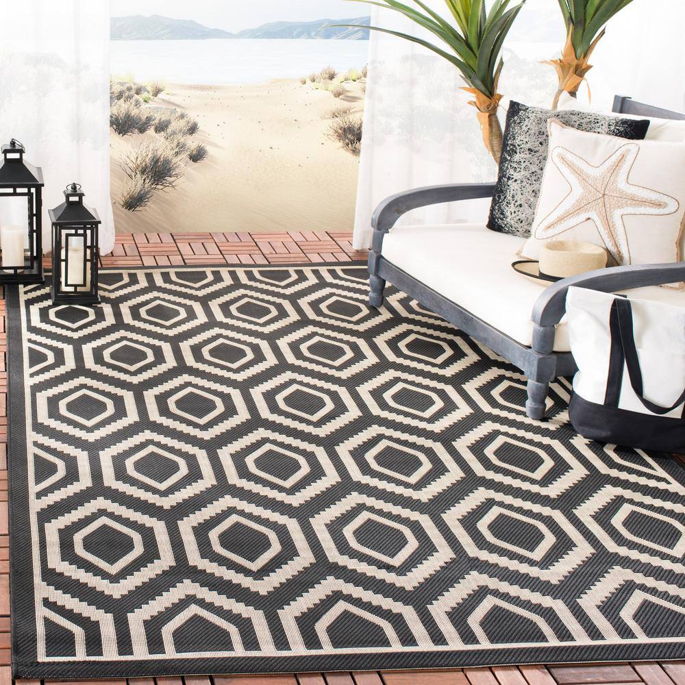 Rectangular Black and Beige 5' x 7' Wool Blend Area Rug