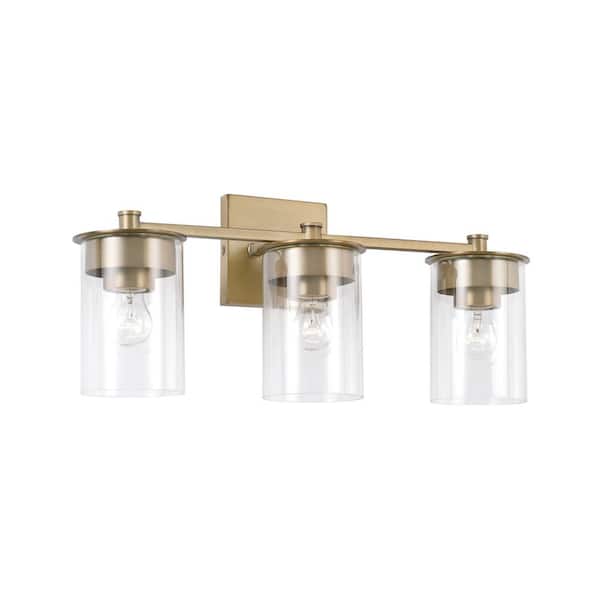 HOMEPLACE LIGHTING 21 in. W x 9 in. H 3-Light Vanity Light in Aged Brass with Clear Glass