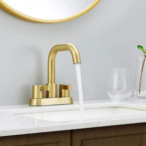 4 in. Centerset Double Handle Mid Arc Bathroom Faucet with Drain Kit Included in Brushed Gold