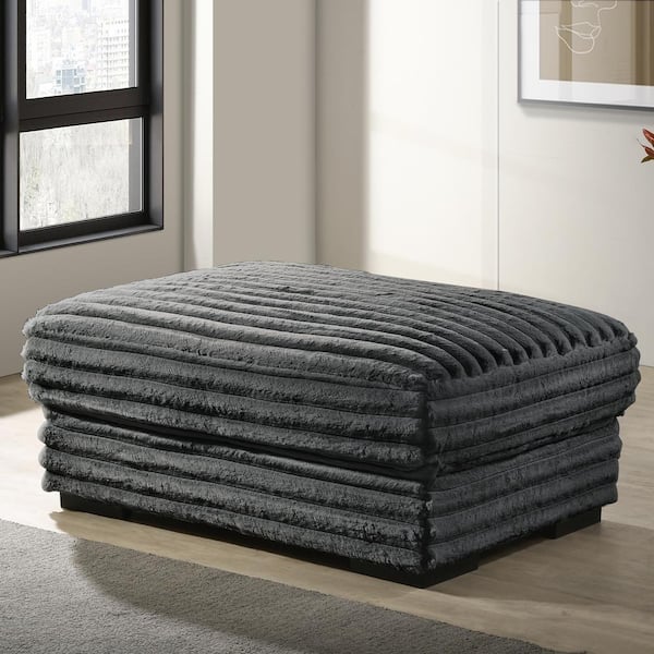 NEW CLASSIC HOME FURNISHINGS New Classic Furniture Embrace Black Polyester Rectangle Ottoman