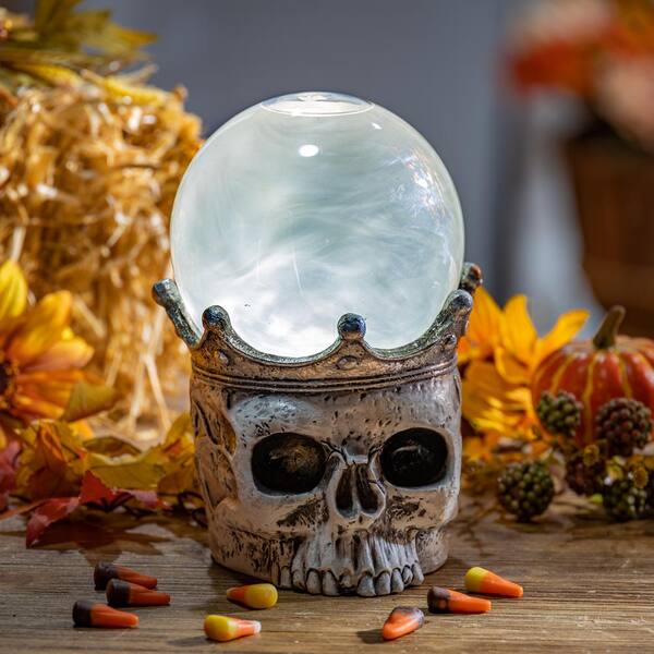 7.5 in. H Battery Operated Lighted Spinning Smoky Water Globe Skull with  Timer