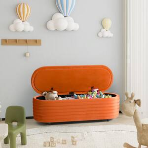 Farrah 54 in. Wide Oval Velvet Upholstered Entryway Flip Top Storage Bedroom Accent Bench in Orange