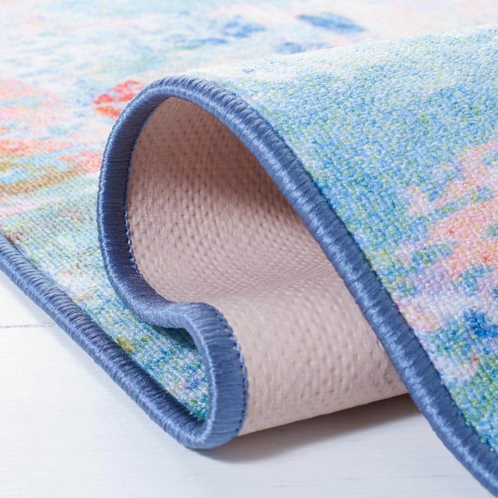 Blush Pink and Green Abstract Synthetic 9' x 12' Area Rug