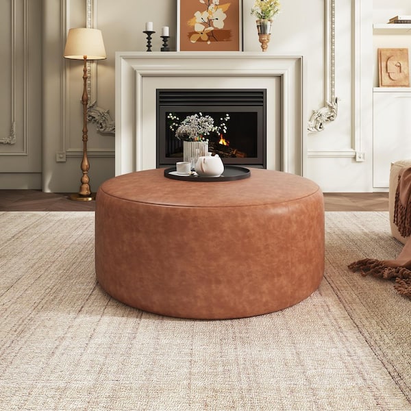 Cesar Brown Modern Upholstered Faux Leather Round Accent Ottoman
