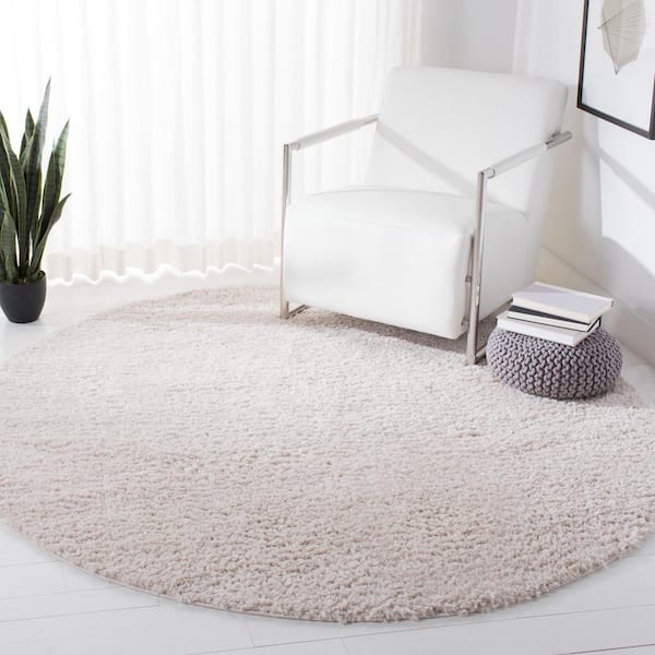 August Shag Beige 9 ft. x 9 ft. Round Solid Area Rug