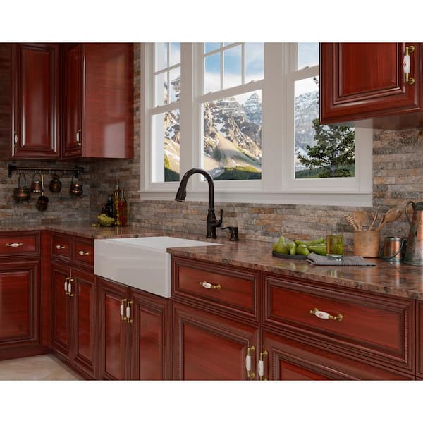 https://images.thdstatic.com/productImages/6ec951c7-dd97-485e-8021-dd77ee1560a5/svn/tuscan-bronze-pfister-pull-down-kitchen-faucets-f-529-7rssry-fa_600.jpg