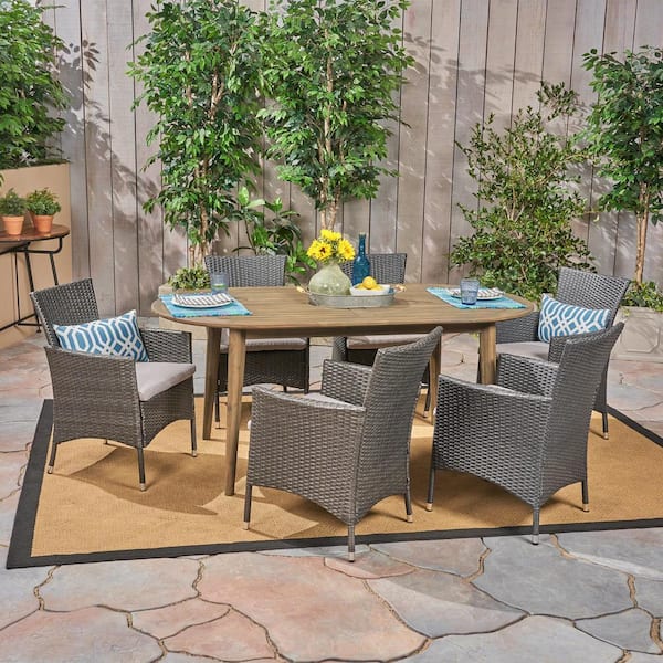 Noble House Stamford Grey 7-Piece Wood and Grey Faux Rattan Outdoor Dining Set with Silver Cushions