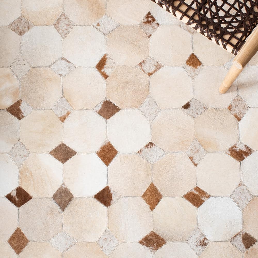 Hand-Stitched Ivory and Brown Geometric Cowhide Rug - 2'3" x 9'