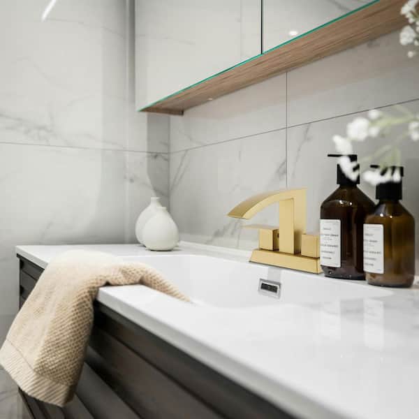 304 Stainless Steel 4 in. Centerset Double Handle Bathroom Faucet with Drain Kit Included in Gold