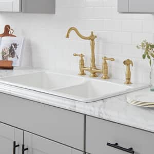 Lyndhurst Double-Handle Bridge Kitchen Faucet With Side Sprayer in Matte Gold
