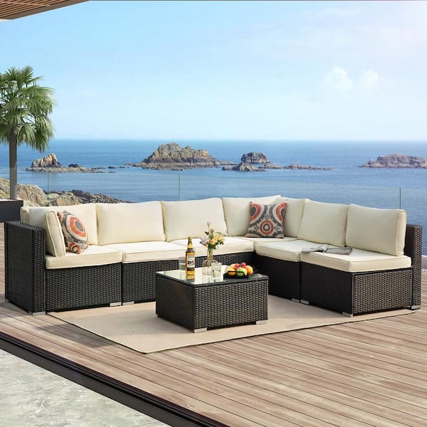 Cesicia 7-Piece Wicker Outdoor Sectional Set with Beige Cushions and Coffee Table