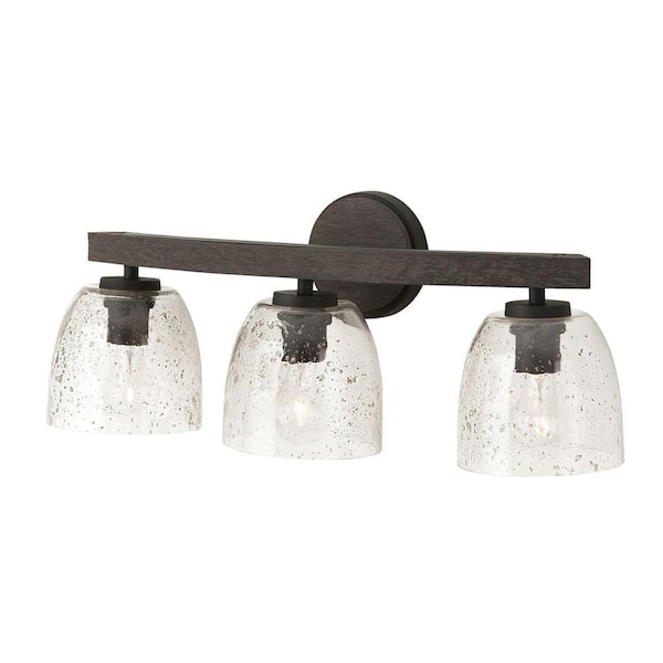Capital Lighting Fixture Company Clive 24.5 in. W x 9.5 in. H 3-Light Carbon Grey and Black Iron Vanity Light with Stone Seeded Glass
