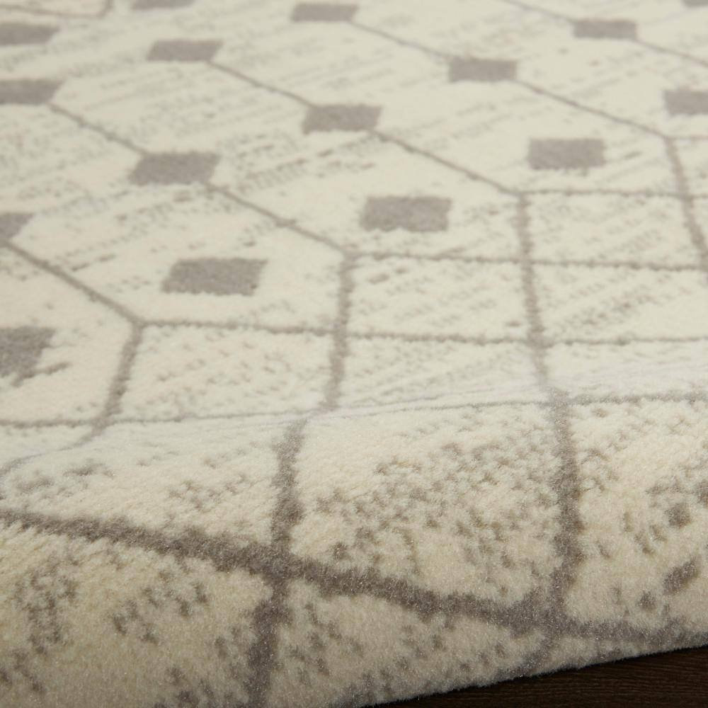 Ivory and Grey Moroccan Diamond 6' x 9' Synthetic Area Rug