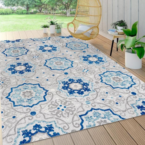 https://images.thdstatic.com/productImages/6f2f82a1-1166-4224-a1cf-22ae0d8ad71e/svn/blue-gray-jonathan-y-outdoor-rugs-amc101a-9-40_600.jpg