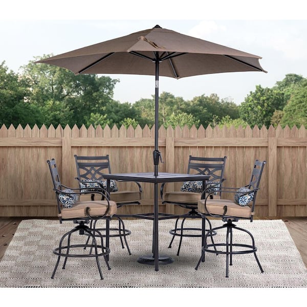 Hanover Montclair 5-Piece Steel Outdoor Dining Set with Tan Cushions, 4 Swivel Chairs, 33 in. Counter Height Table and Umbrella