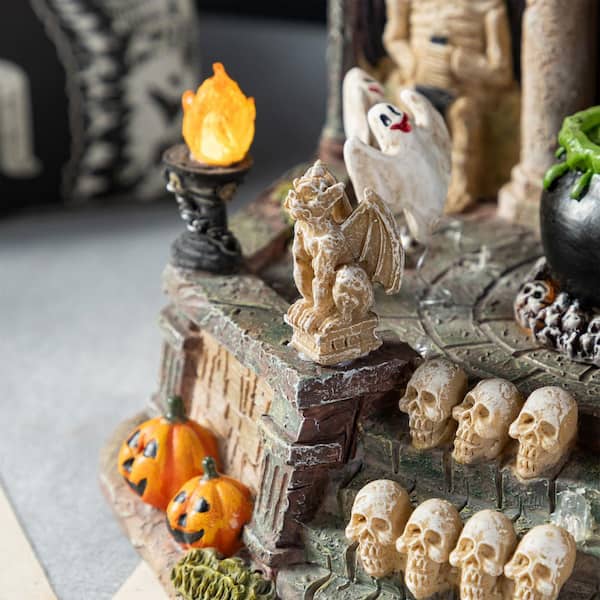 Glitzhome 9.75 in. H Lighted Resin Halloween Haunted House Village
