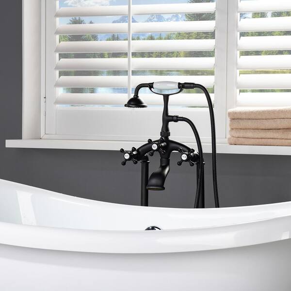 https://images.thdstatic.com/productImages/6f417897-f41c-46dc-bca8-f7f383affeff/svn/matte-black-woodbridge-claw-foot-tub-faucets-f1083-77_600.jpg