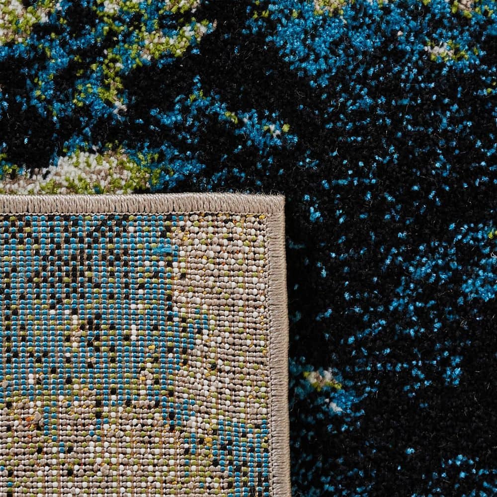 Navy and Green Abstract 4' x 6' Synthetic Area Rug