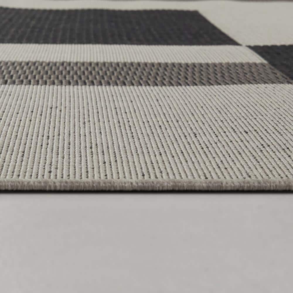 Galvin Tan and Black Geometric Synthetic Indoor/Outdoor Area Rug