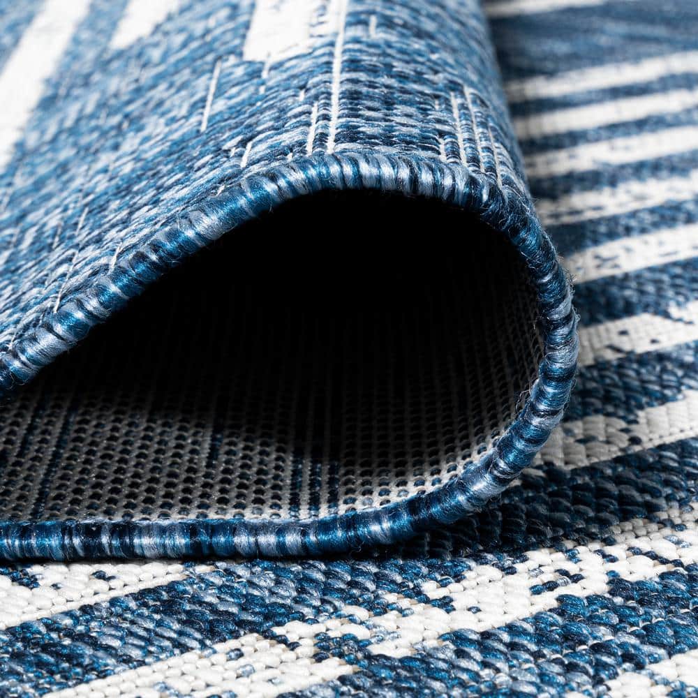 Bohemian Stripe Blue and Ivory Synthetic Area Rug 5' x 8'