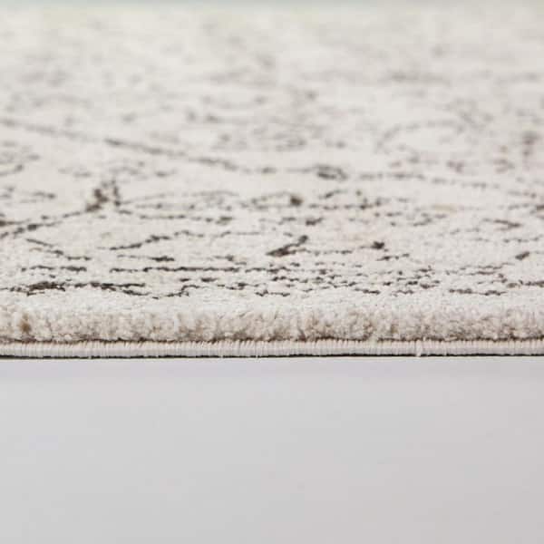 Aleksis Cream 7 ft. 10 in. x 10 ft. Oriental Area Rug