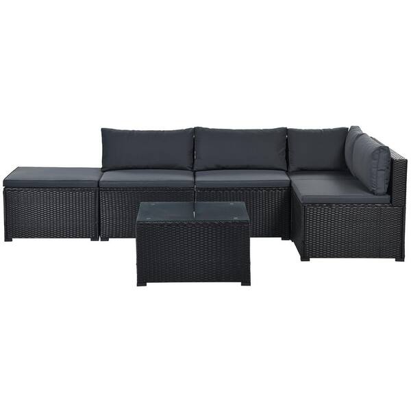 black rattan furniture with grey cushions